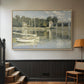 Natural wood floater framed canvas featuring a riverside view with architecture and nautical activity, displayed in a hallway near a staircase.