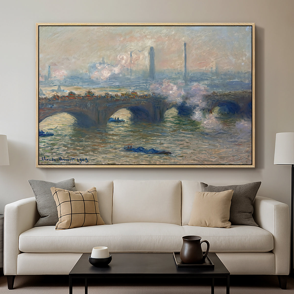 Waterloo Bridge, Gray Day, 1903 by Claude Monet displayed in a natural wood floater framed canvas above a sofa in a clean living room.