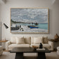 The Beach at Sainte-Adresse, 1867 by Claude Monet as a natural wood floater framed canvas featuring a seaside promenade with figures, flags, and boats along the coast, displayed above a sofa in a modern living room.