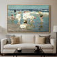 A Holiday, c. 1915 by Edward Henry Potthast displayed in a natural wood floater framed canvas above a sofa in a clean living room.