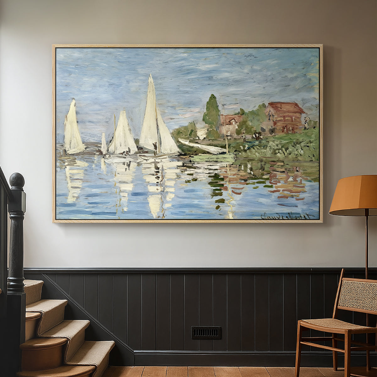 Natural wood floater framed canvas featuring a dynamic nautical scene with boats moving across river, displayed in a hallway near a staircase.