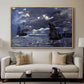 A Seascape, Shipping by Moonlight, 1864 by Claude Monet displayed in a natural wood floater framed canvas above a sofa in a clean living room.