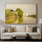 Houses on the Achterzaan, 1871 by Claude Monet displayed in a natural wood floater framed canvas above a sofa in a clean living room.