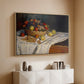 Natural wood floater framed canvas of Still Life with Apples and Grapes, 1880 by Claude Monet, featuring an impressionist still life of fruit placed on cloth-covered surface above a console cabinet in a minimalist entryway.