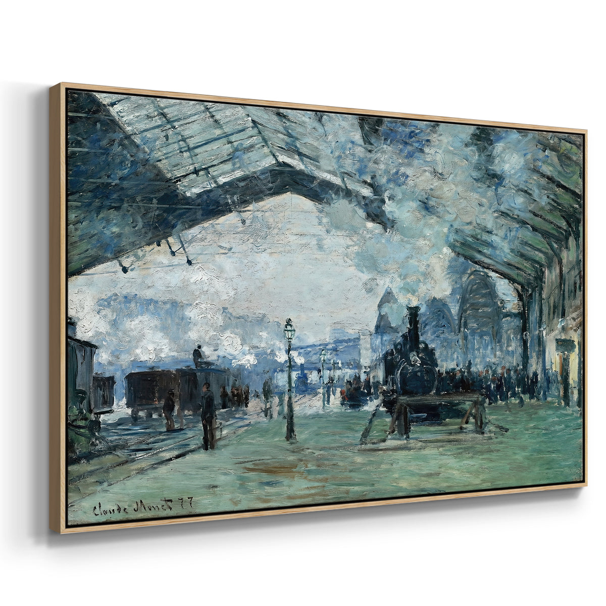 Angled view of The Saint-Lazare Station, 1877 by Claude Monet in a natural wood floater framed canvas.