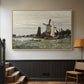 Natural wood floater framed canvas featuring a countryside structure standing against open sky, displayed in a hallway near a staircase.