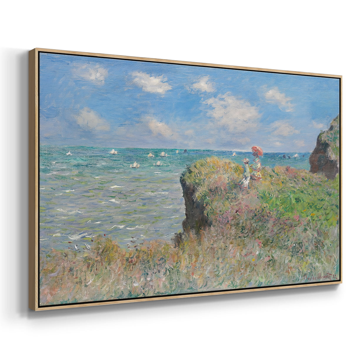 Angled view of The Cliff Walk at Pourville, 1882 by Claude Monet in a natural wood floater framed canvas.