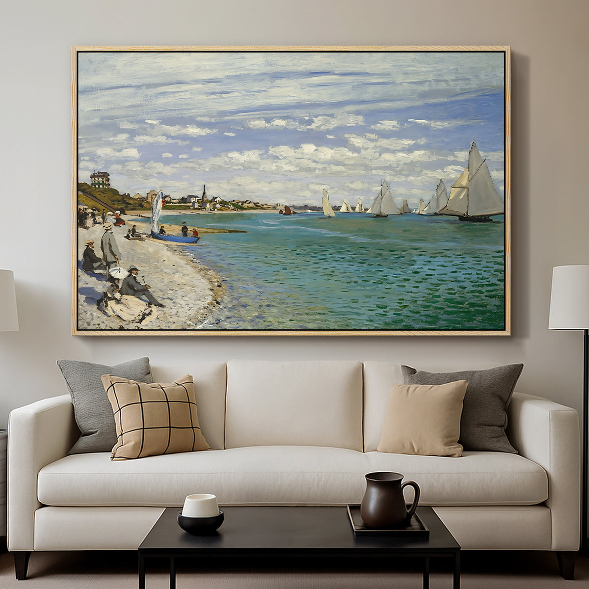 Regatta at Sainte-Adresse, 1867 by Claude Monet displayed in a natural wood floater framed canvas above a sofa in a clean living room.