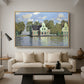 Houses on the Zaan River at Zaandam, 1871 by Claude Monet as a natural wood floater framed canvas featuring a row of houses along river with reflections in calm water, displayed above a sofa in a modern living room.