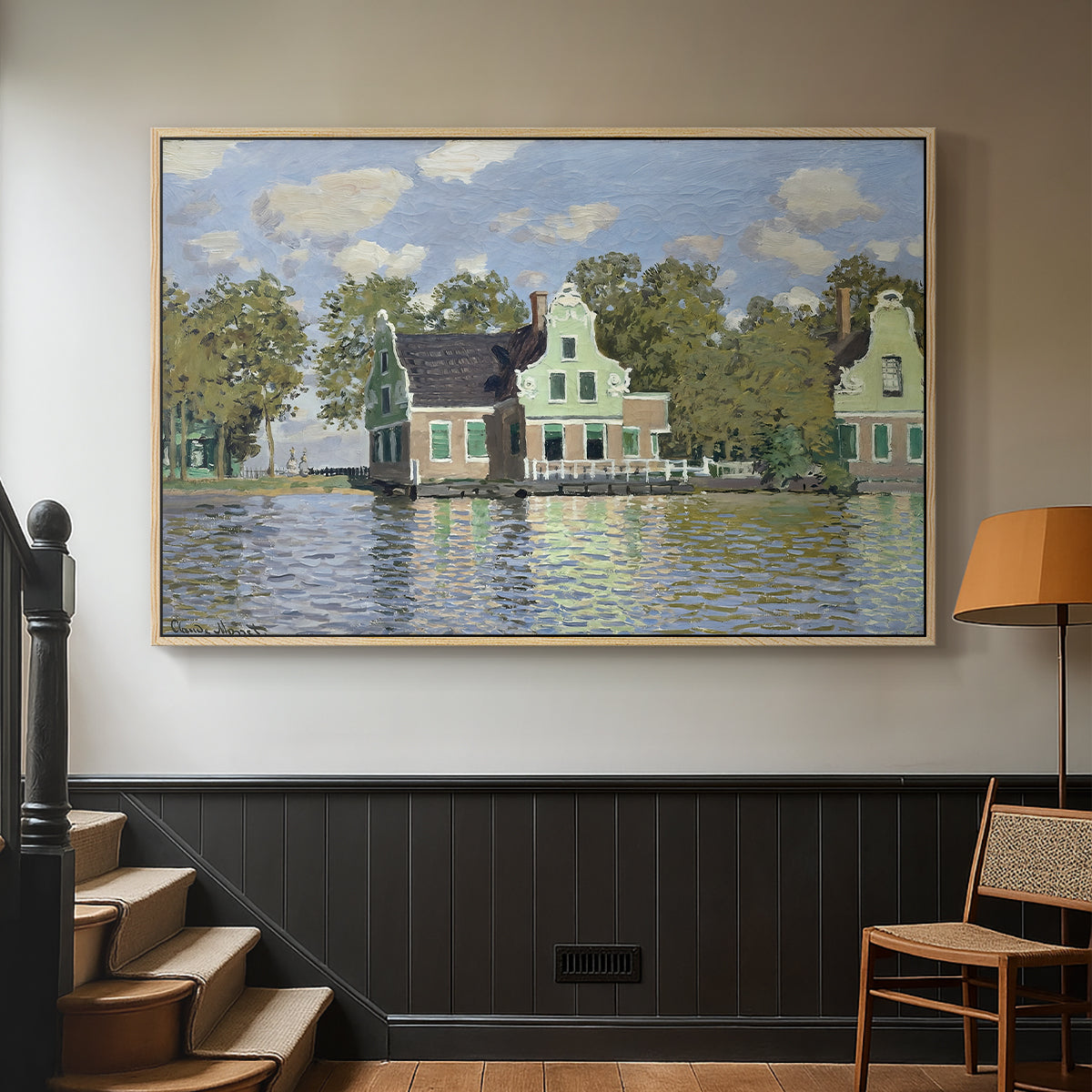 Natural wood floater framed canvas featuring a waterfront architecture with still reflections, displayed in a hallway near a staircase.