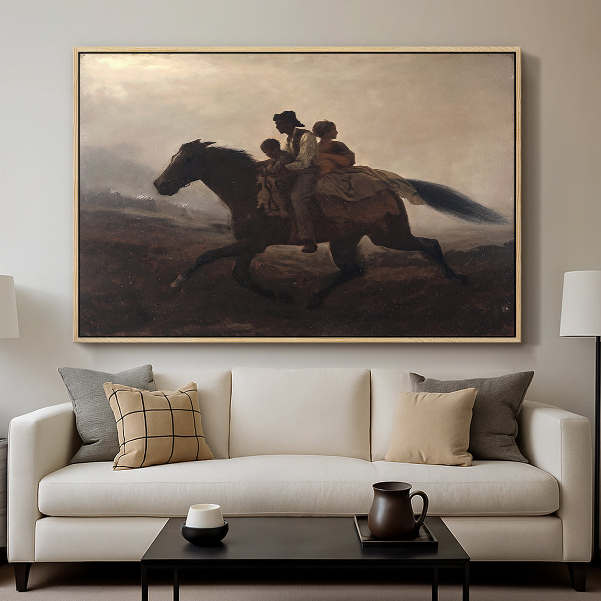 A Ride for Liberty – The Fugitive Slaves, c. 1862 by Eastman Johnson displayed in a natural wood floater framed canvas above a sofa in a clean living room.