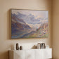 Natural wood floater framed canvas of Odenwinklkees with the Johannisberg, 1902 by Edward Theodore Compton, featuring a mountain scene with glacier stretching through rocky valley above a console cabinet in a minimalist entryway.