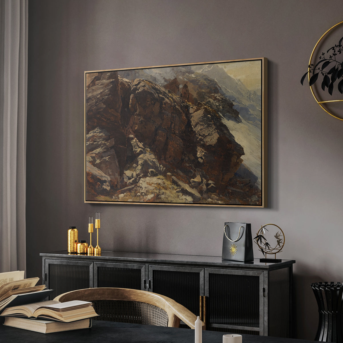 High Mountain Study, c. 1870 by Edward Theodore Compton in a natural wood floater framed canvas featuring a high-altitude scene with rocky formations and sparse vegetation, displayed above a desk in a dark home office interior.