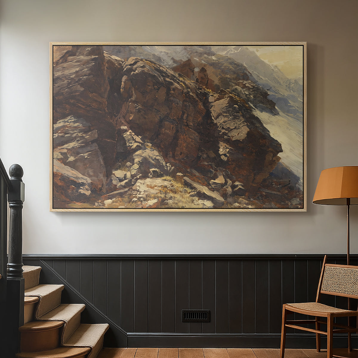 Natural wood floater framed canvas featuring a realistic depiction of mountainous terrain under open sky, displayed in a hallway near a staircase.