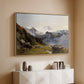Natural wood floater framed canvas of The Großglockner from the Prager Hut, 1890 by Edward Theodore Compton, featuring a mountain summit seen from elevated viewpoint with surrounding landscape above a console cabinet in a minimalist entryway.