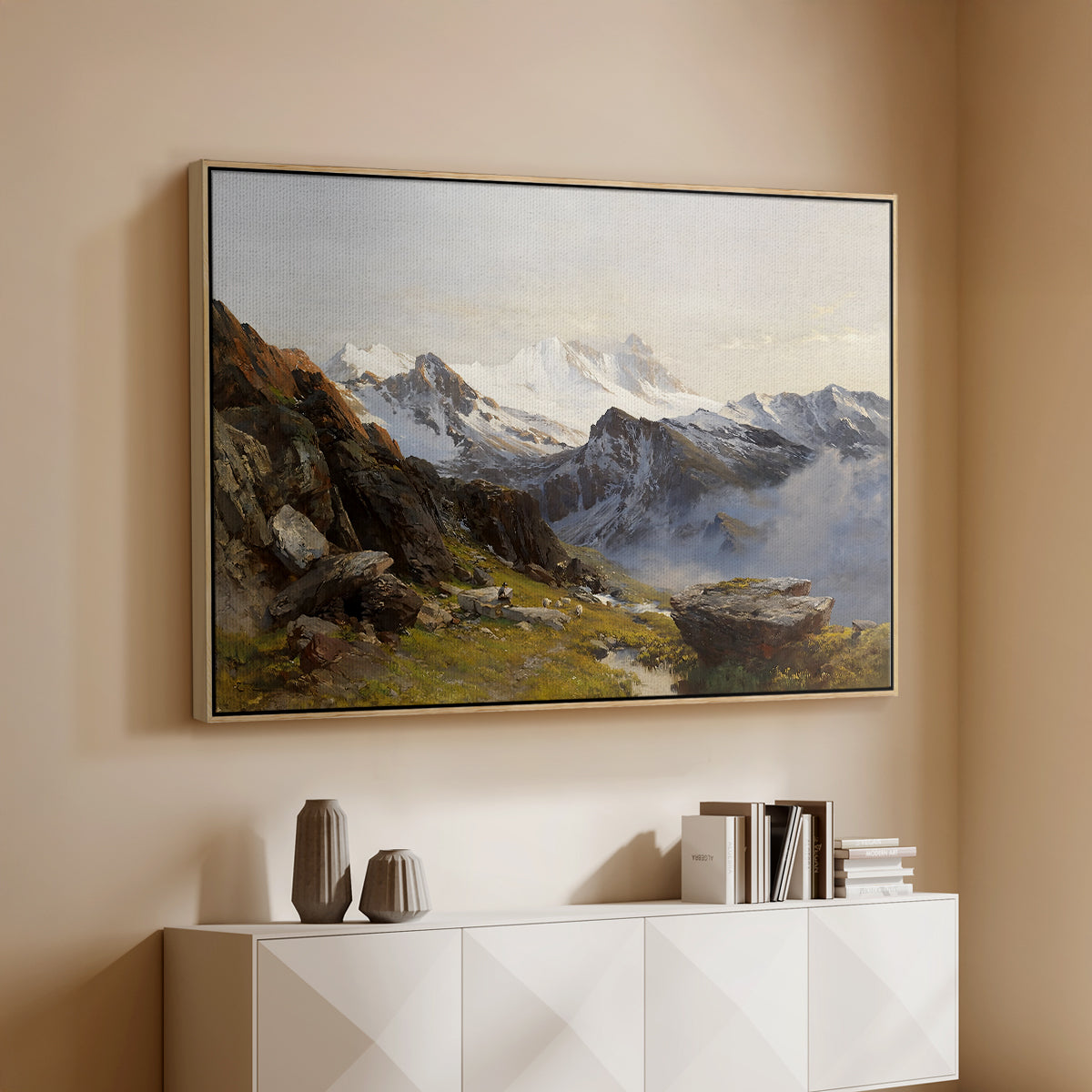 Natural wood floater framed canvas of The Großglockner from the Prager Hut, 1890 by Edward Theodore Compton, featuring a mountain summit seen from elevated viewpoint with surrounding landscape above a console cabinet in a minimalist entryway.