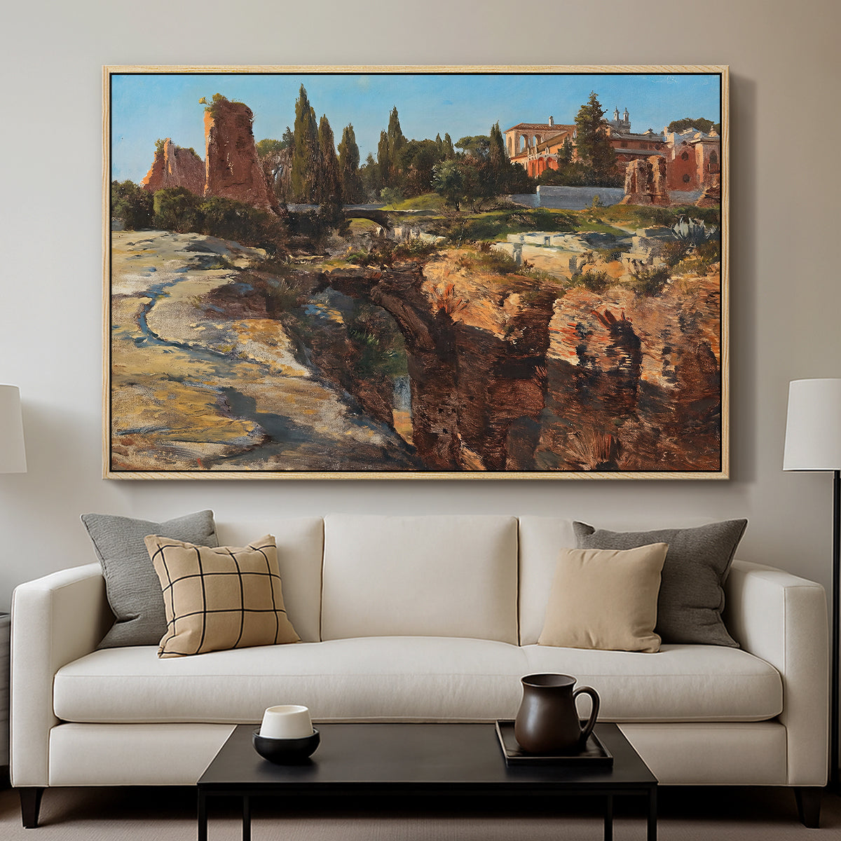 Palatine in Rome, c. 1921 by Edward Theodore Compton displayed in a natural wood floater framed canvas above a sofa in a clean living room.