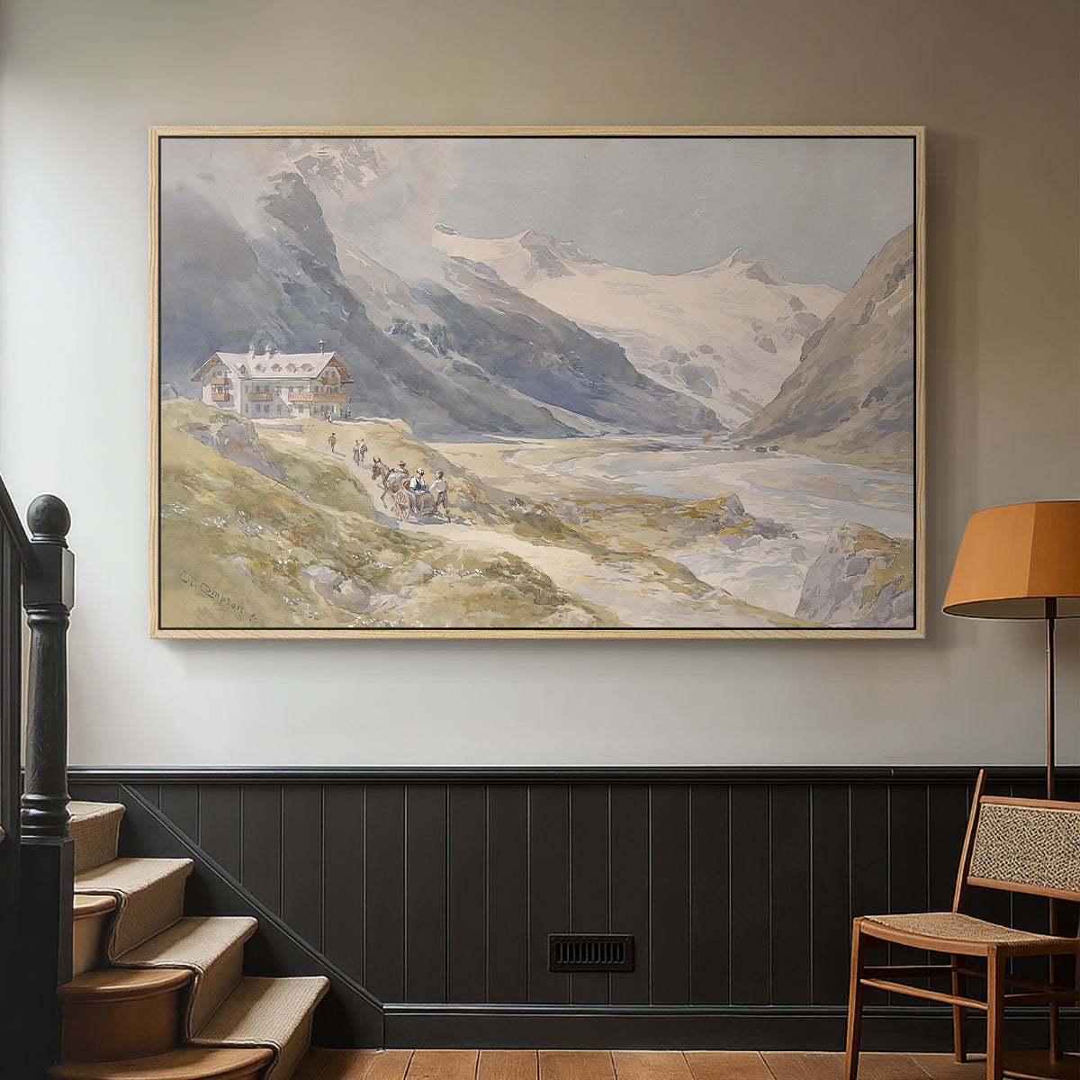 Natural wood floater framed canvas featuring a natural landscape with human presence among mountains, displayed in a hallway near a staircase.