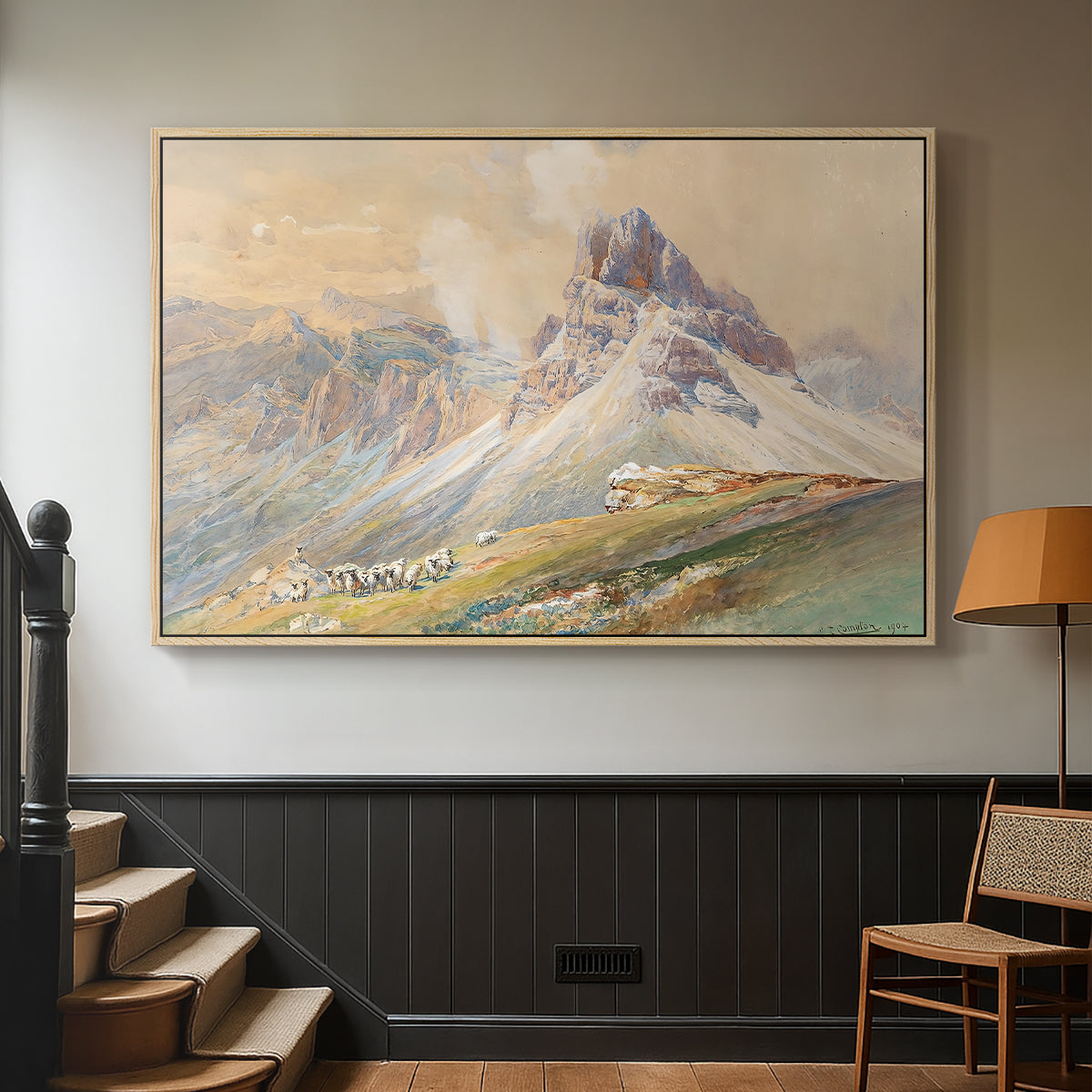 Natural wood floater framed canvas featuring a realistic mountain view with strong geological forms, displayed in a hallway near a staircase.