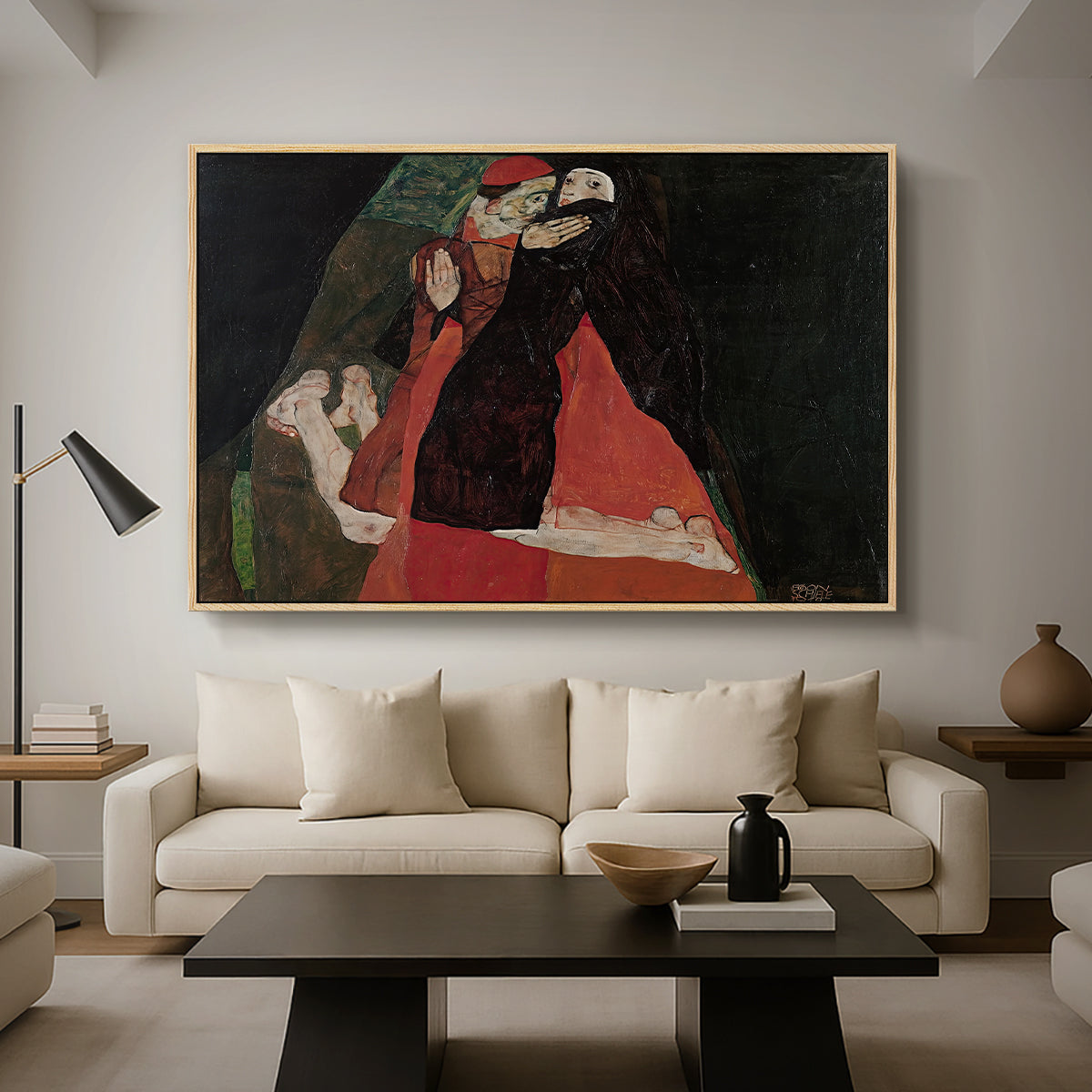 Cardinal and Nun (Caress), 1912 by Egon Schiele as a natural wood floater framed canvas featuring two figures embracing intimately in stylized expressionist composition, displayed above a sofa in a modern living room.