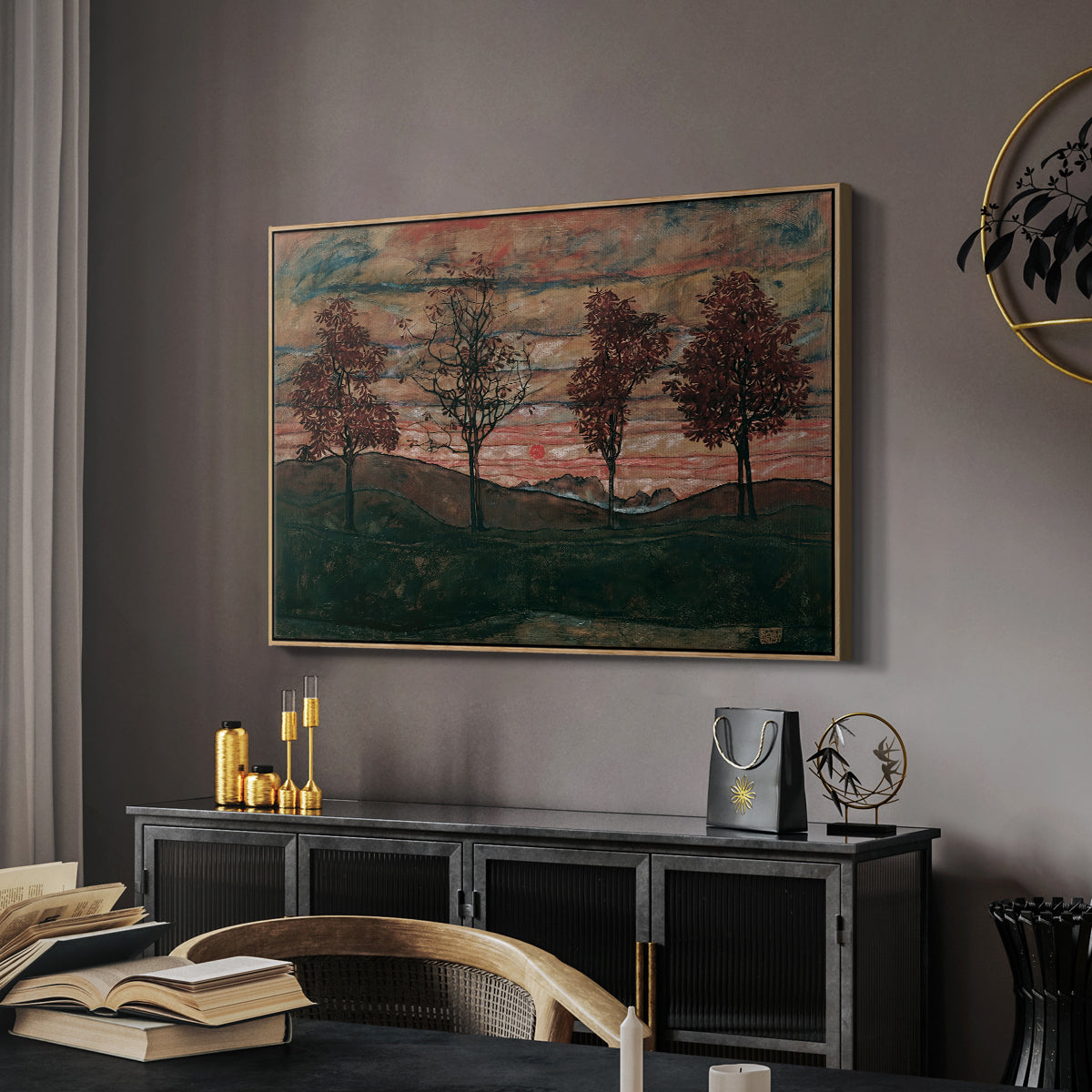 Four Trees, 1917 by Egon Schiele in a natural wood floater framed canvas featuring a stylized nature scene with strong outlines and simple composition, displayed above a desk in a dark home office interior.