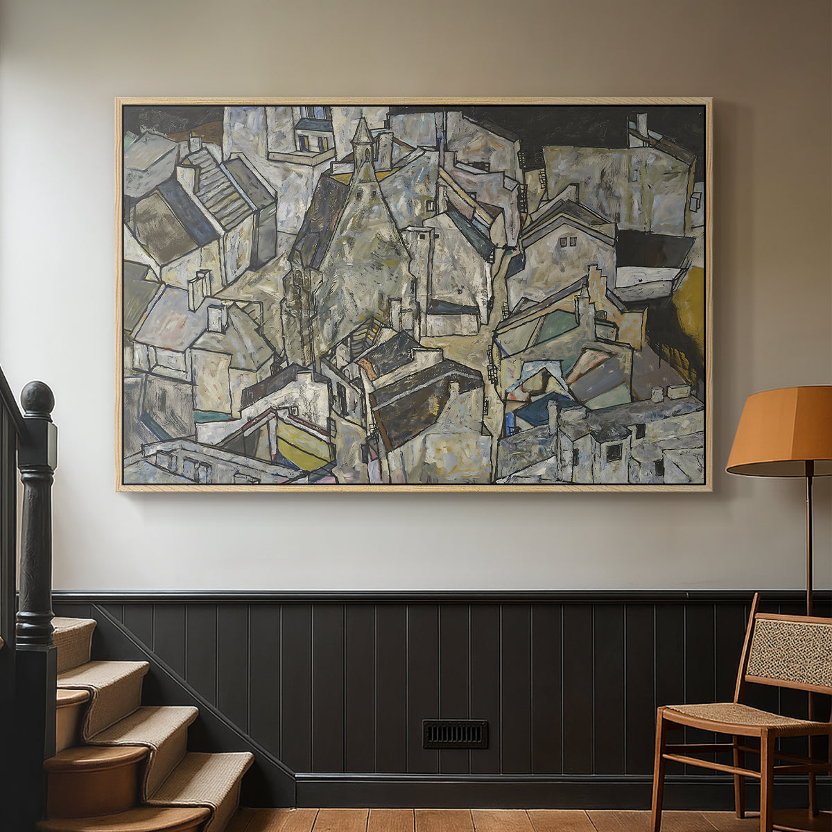 Natural wood floater framed canvas featuring a stylized urban composition with geometric structures and muted tones, displayed in a hallway near a staircase.