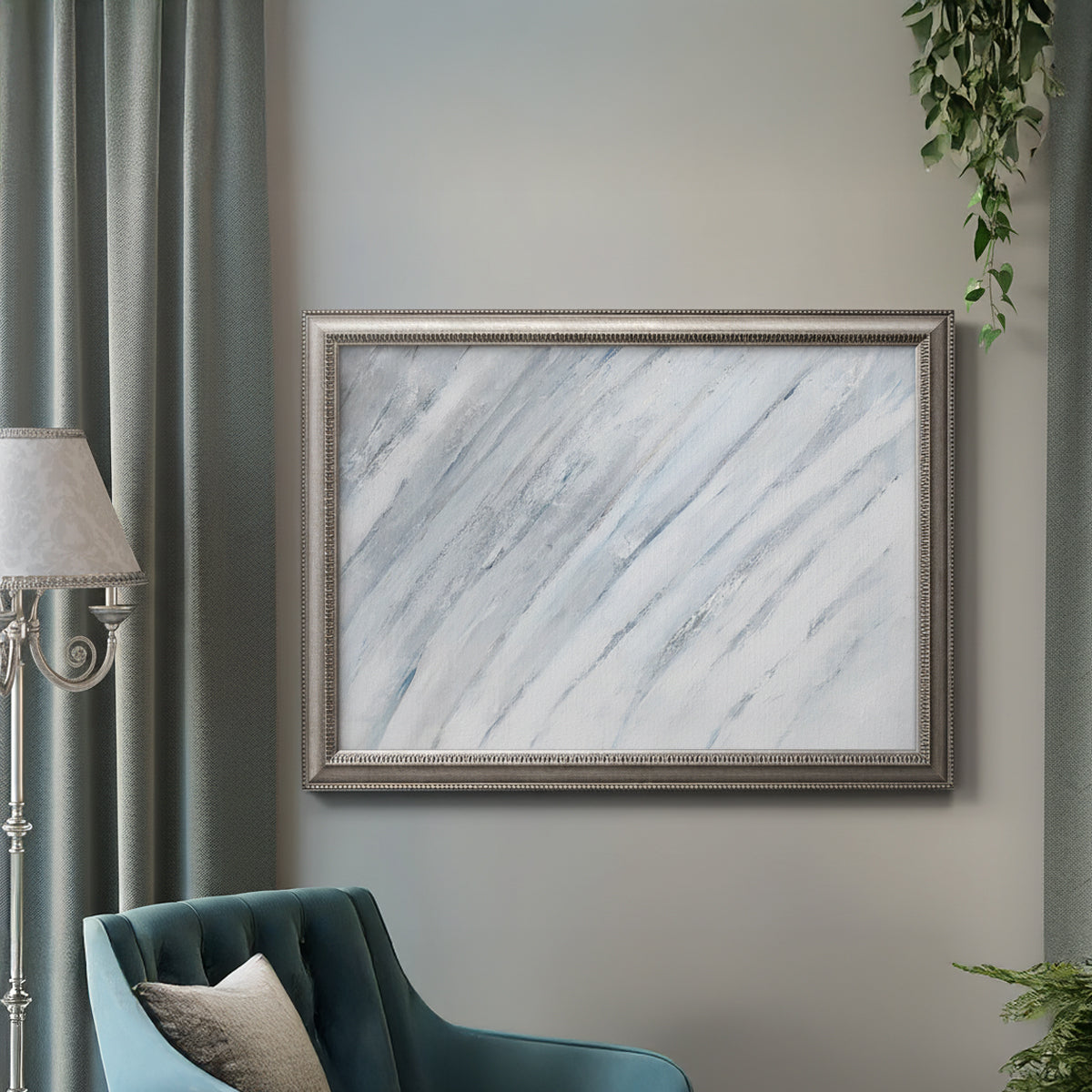 Zen-inspired minimalist abstract frond artwork in an ornate vintage silver frame displayed in a neutral interior setting.